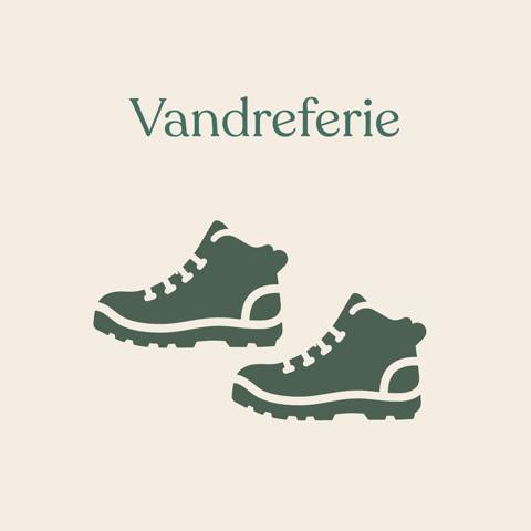 Grafik med to vandrestøvler, der symboliserer en vandreferie med Vitus Rejser.